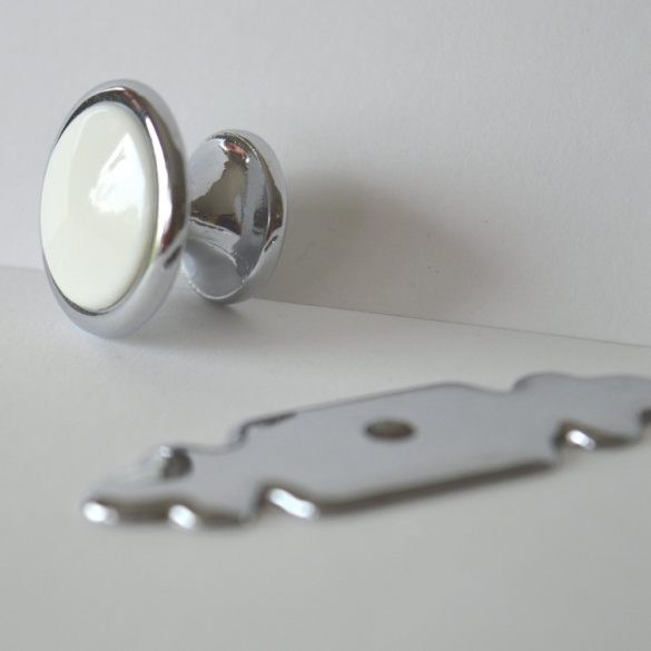 Metal base with plastic insert. Knob furniture handle
