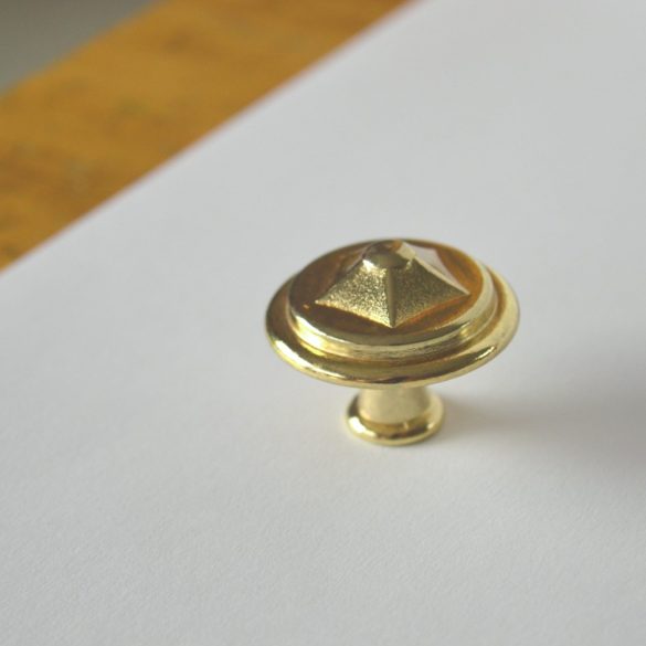 Furniture handle, gold coloured metal furniture knob