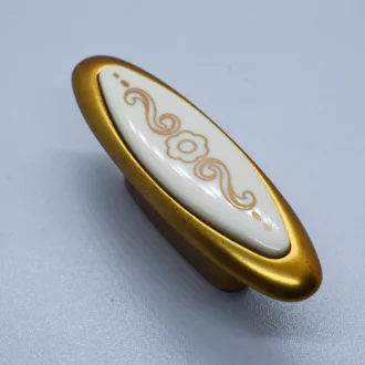   Fém bútorfogantyú, francia arany - virág mintával, 32 mm furattávval