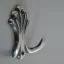 15.722.00.11 Patinierter schwarzer Kleiderhaken aus Metall