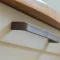 24.4206.02 CISSI Möbelgriff, 160 mm Bohrung – Farbe: Kaffeebraun