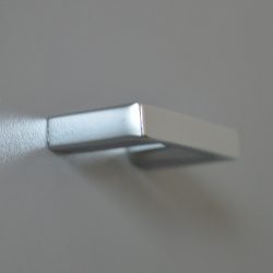   Shiny chrome coloured metal furniture handle with 32 mm hole spacing