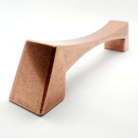   CALEIDO fém bútorfogantyú, antik réz színű, 128 mm furattávval