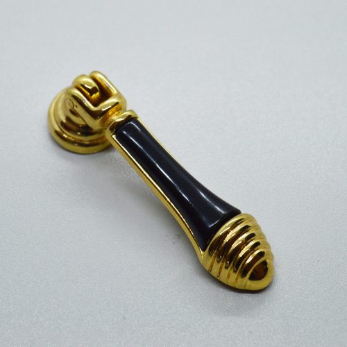Klassischer gold-schwarzer Möbelknopf aus Metall und Kunststoff