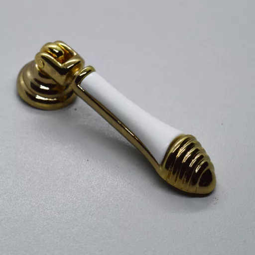 Klassischer gold-weiss Möbelknopf aus Metall und Kunststoff