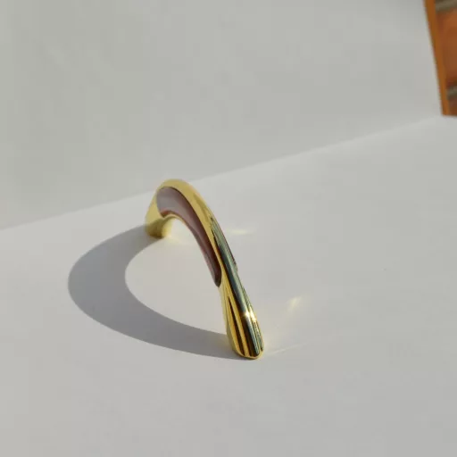 Metall-Kunststoff-Möbelgriff, gold-rot mahagonifarben, Bohrung 96 mm