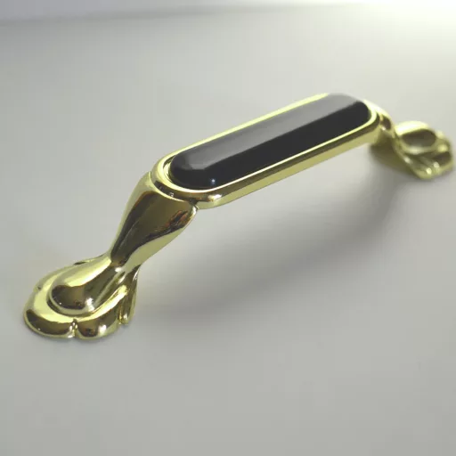 Metall-Kunststoff-Möbelgriff, Farbe gold-schwarz, Bohrung 96 mm