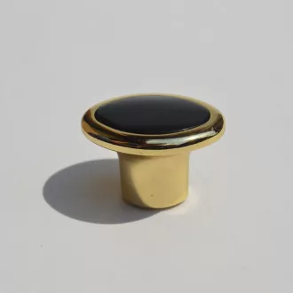   Retro-Möbelgriff mit goldfarbenem Metallende - kombiniert mit schwarzem Kunststoffelement