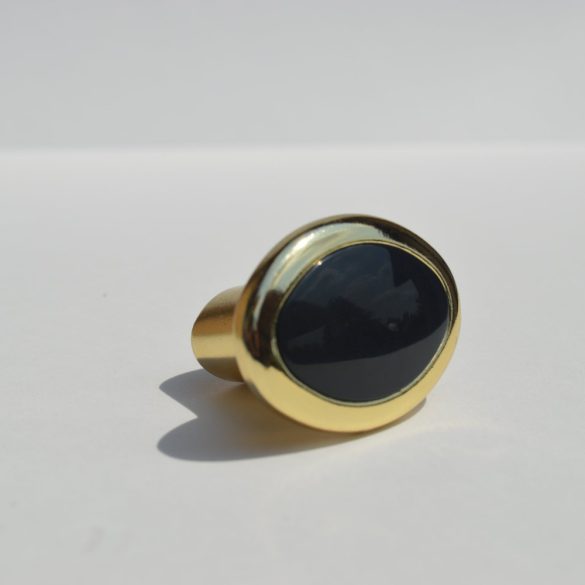 Retro furniture handle with gold coloured metal end - combined with black coloured plastic element