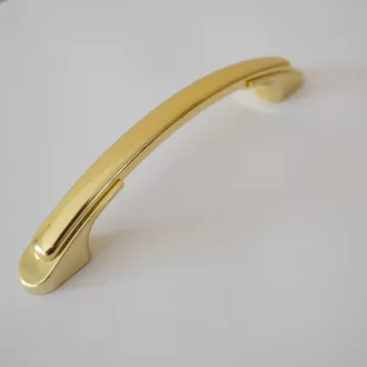   Kunststoff-Möbelgriff, schwarzes Ende - goldfarben, Bohrung 96 mm