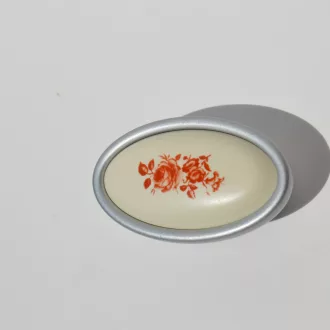   Fém-műanyag bútorfogantyú, matt króm színű, virág mintával, 16 mm furattávval