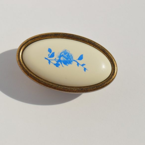 Fém-műanyag bútorfogantyú, bronz színű kék virág mintával, 16 mm furattávval