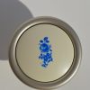 Metall-Kunststoff-Möbelknopf in Champagnerfarbe mit blauem Blumenmuster