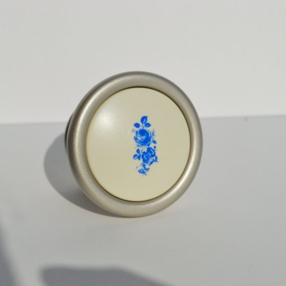Metal-plastic furniture knob in champagne colour with blue flower pattern