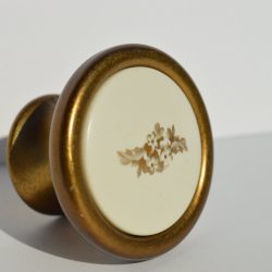   Metal-plastic furniture knob, French gold colour with flower pattern
