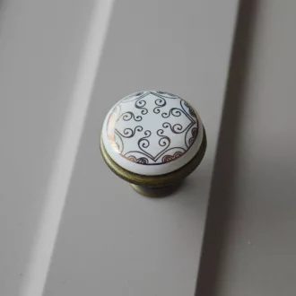   Fém-porcelán bútorgomb, bronz talp - arany színű motívummal 