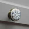 Möbelknauf aus Metall-Porzellan, Sockel aus Bronze - mit Goldmotiv  