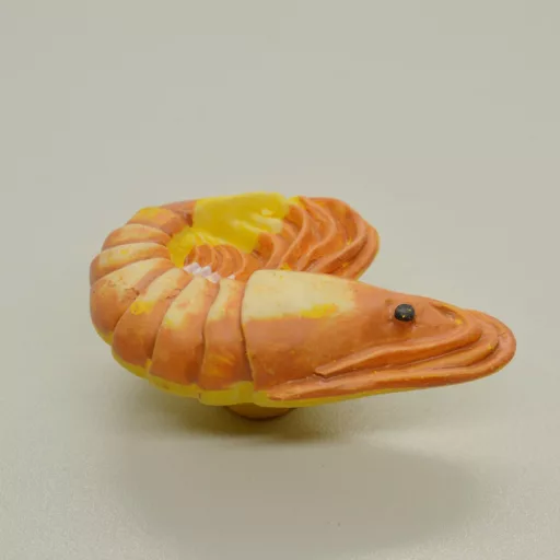 Műanyag bútorgomb, garnéla figurás