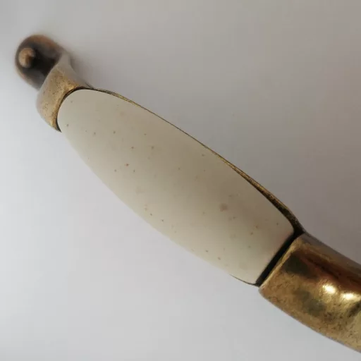 Porcelán bútorfogantyú, bronz - gres színű porcelán résszel, 128 mm furattávval
