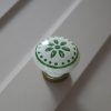 Fém-porcelán bútorgomb, bézs - bronz színű, zöld virág mintával