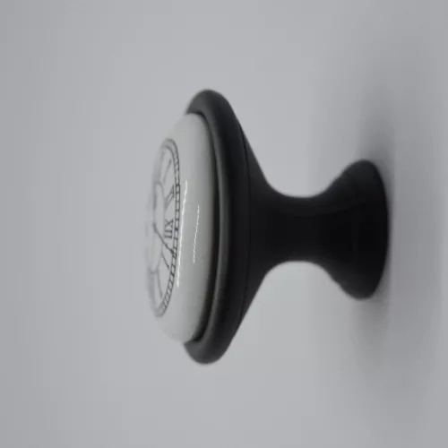 Mattschwarzes Metall - weißer Porzellan-Möbelknopf mit Uhrenmotiv