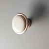 Óezüst, antikolt fém - porcelán bútorgomb, törtfehér porcelán résszel