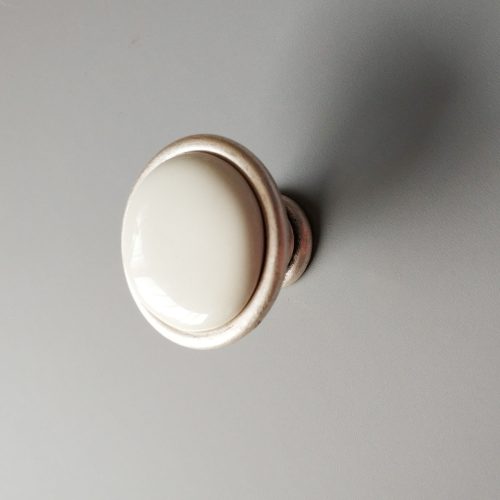 Óezüst, antikolt fém - porcelán bútorgomb, törtfehér porcelán résszel