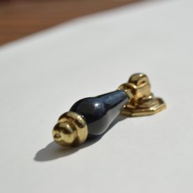 Fém-műanyag bútorgomb, arany - fekete színű