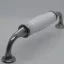 LIMOGES Weißer 128-mm-Möbelgriff mit antik-schwarzen Metallenden - weißes Porzellanteil