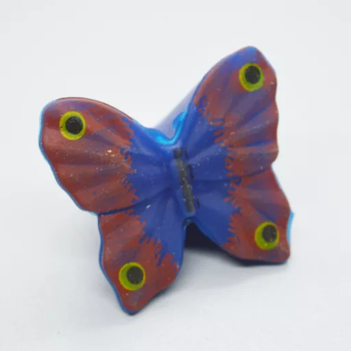 Möbelknopf aus Kunststoff, blauer-rot Schmetterling