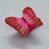 Műanyag bútorgomb, rózsaszín pillangó figurás