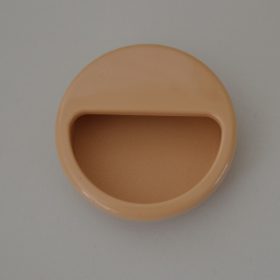   Süllyeszthető, világos barna színű, műanyag bútorfogantyú