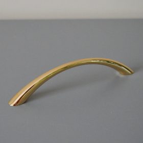   Fém bútorfogantyú, sárgaréz színű, 128 mm furattávval