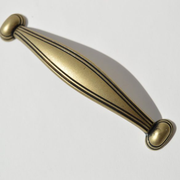 Gold coloured metal furniture handle