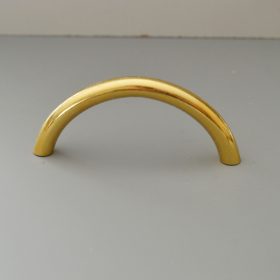   Fém bútorfogantyú, fényes arany színű, 64 mm furattávval, 2. osztályú