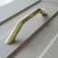 UN78 – Möbelgriff mit 128 mm Bohrung, goldfarben