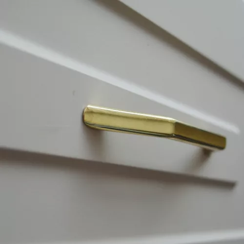 UN78 – Möbelgriff mit 128 mm Bohrung, goldfarben