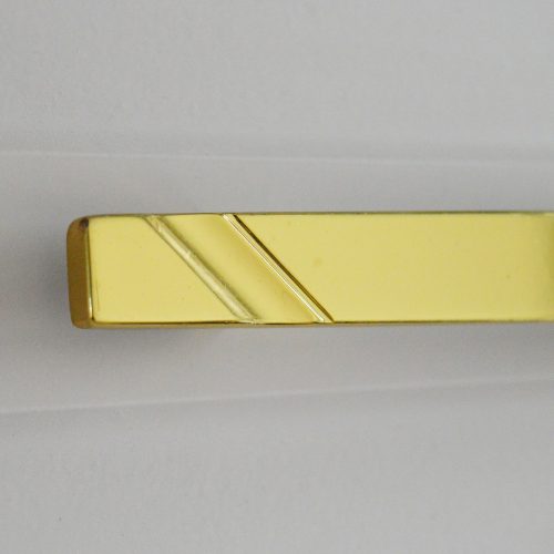 II. Osztályú Fém bútorfogantyú,  arany színű, 128 mm furattávval