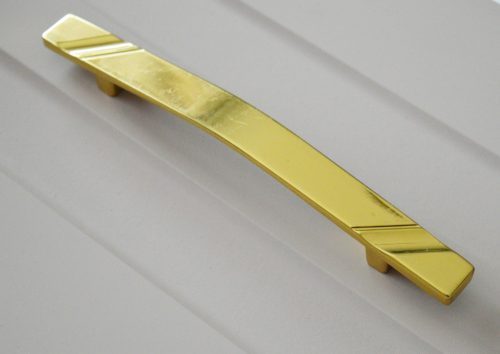 II. Osztályú Fém bútorfogantyú,  arany színű, 128 mm furattávval