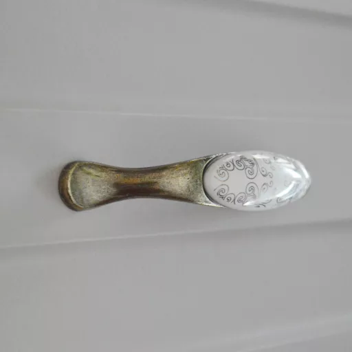 Porzellan-Metall-Möbelgriff, bronze- gold  motiv, Bohrung 96 mm