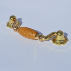 Furniture handle in oak-gold colour, metal-wood material