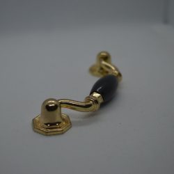 Black-gold coloured metal-wood furniture handle