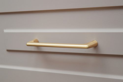 OCTAVIO Fém fogantyú, 128 mm furattáv, csiszolt arany