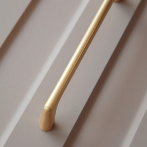 OCTAVIO Fém fogantyú, 128 mm furattáv, csiszolt arany