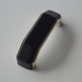   10 db MŰANYAG, arany - fekete bútorfogantyú, 64 mm furattáv