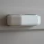 Kunststoff, silber-weißer Möbelgriff, 64 mm Bohrung, 2. Klasse